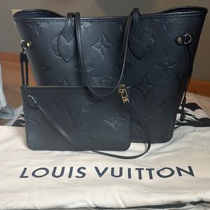 Louis Vuitton Neverfull MM tote in embossed Monogram Empreinte leather